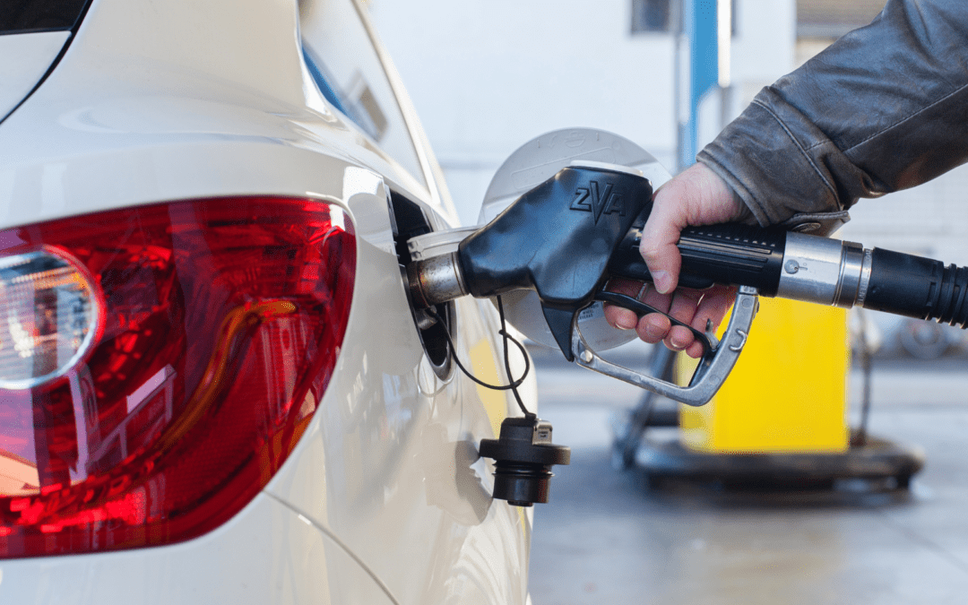 person fueling an ICE car in orange county