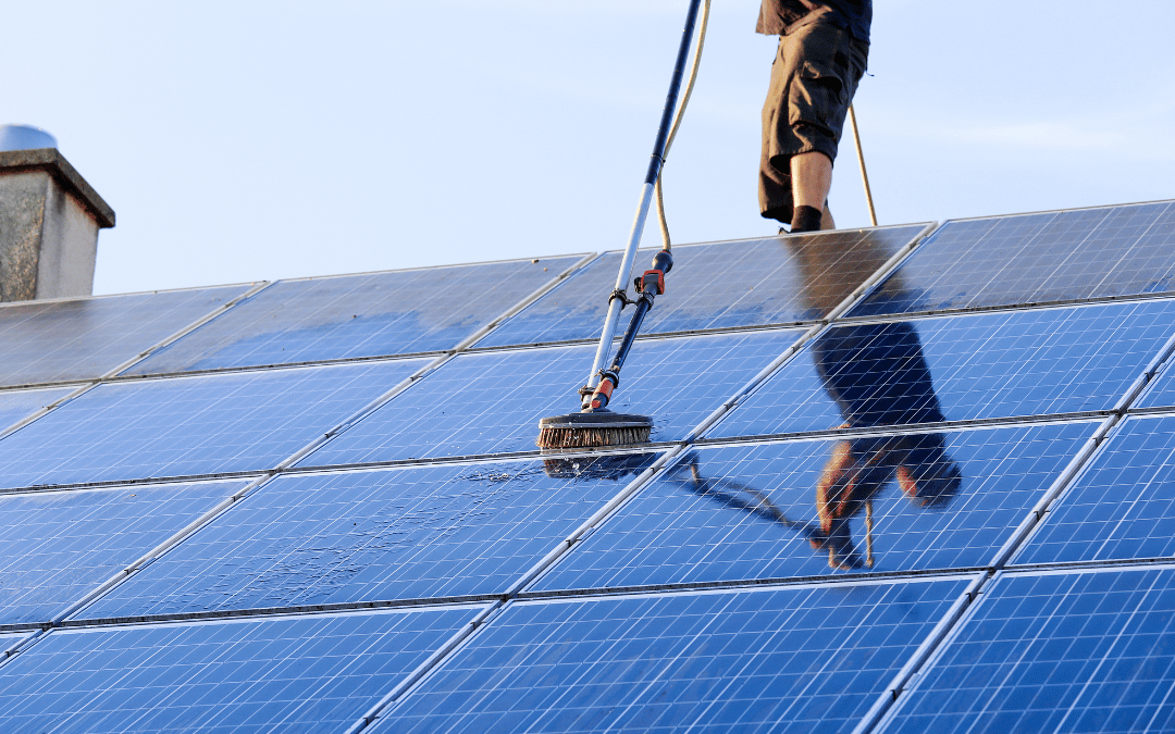 worker from california solar company repower orange cleaning solar panels in orange county