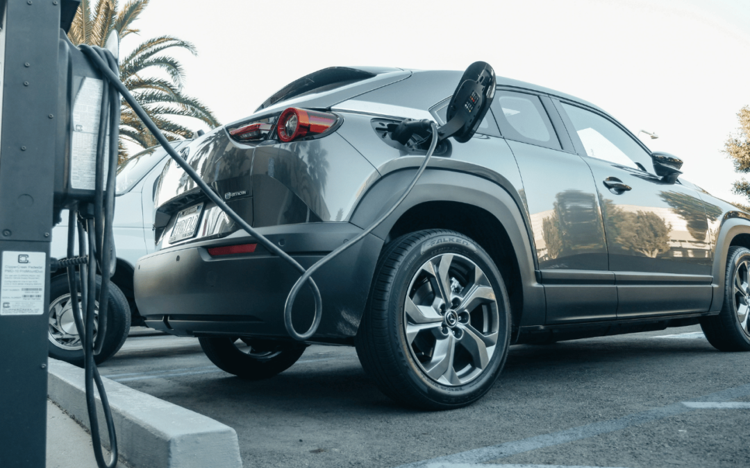 electric vehicle at a commercial ev charging station